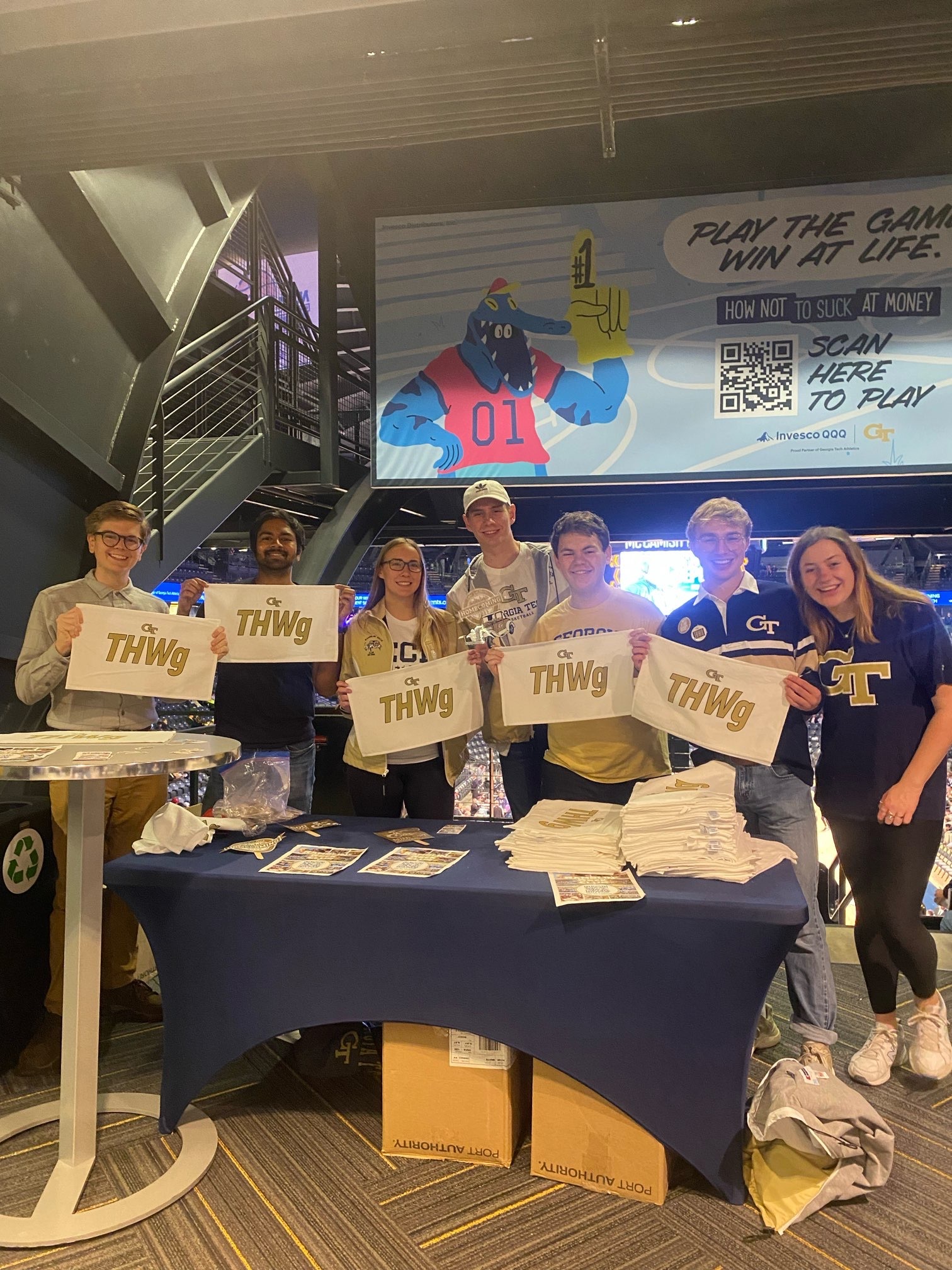 Members of RRC with THWG towels at u[sic]ga basketball game.